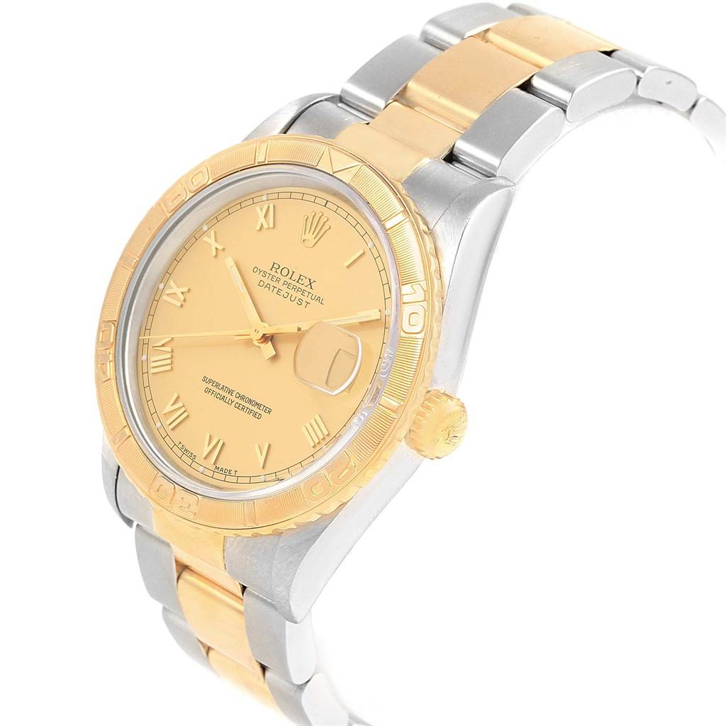 This image shows the Rolex Turn-o-Graph 16263 Men's Steel and Gold (two tone) Champagne Dial 16263 Men's Steel and Gold (two tone) Champagne Dial watch at a three-quarter angle highlighting its face, bezel, and bracelet.