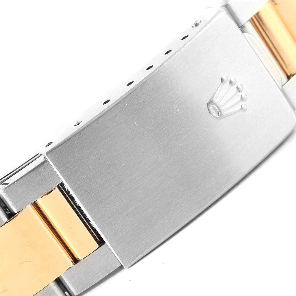 This image shows the clasp and part of the bracelet of a Rolex Turn-o-Graph 16263 Men's Steel and Gold (two tone) Grey Dial 16263 Men's Steel and Gold (two tone) Grey Dial watch.