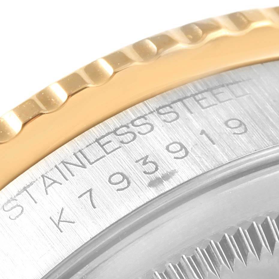 This image shows a close-up of the serial number and edges of the bezel on a Rolex Turn-o-Graph 16263 Men's Steel and Gold (two tone) Grey Dial 16263 Men's Steel and Gold (two tone) Grey Dial watch.