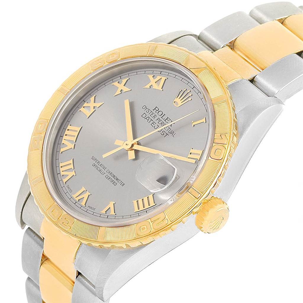 The image shows a Rolex Turn-o-Graph 16263 Men's Steel and Gold (two tone) Grey Dial 16263 Men's Steel and Gold (two tone) Grey Dial watch in a close-up angle, highlighting its dial, bezel, crown, and part of the bracelet.