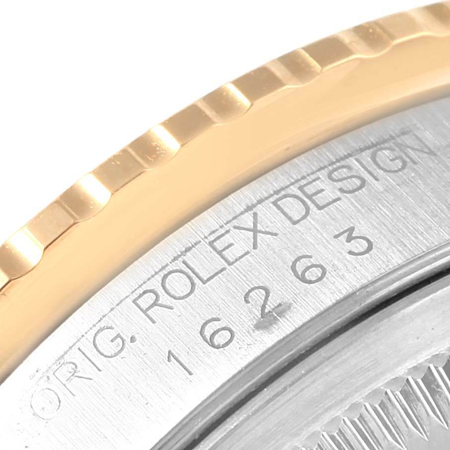 This is a close-up image of the bezel and case edge of a Rolex Turn-o-Graph 16263 Men's Steel and Gold (two tone) Grey Dial 16263 Men's Steel and Gold (two tone) Grey Dial watch, showing part of the model number and brand engraving.