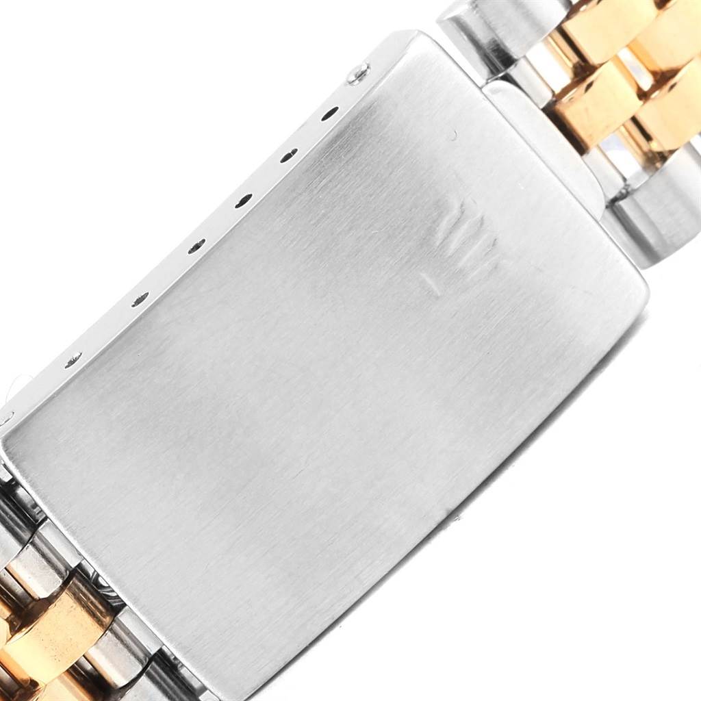 This image shows a close-up of the clasp and bracelet of the Rolex Turn-o-Graph 16263 Men
s Steel and Gold (two tone) Beige Dial 16263 Men
s Steel and Gold (two tone) Beige Dial watch.