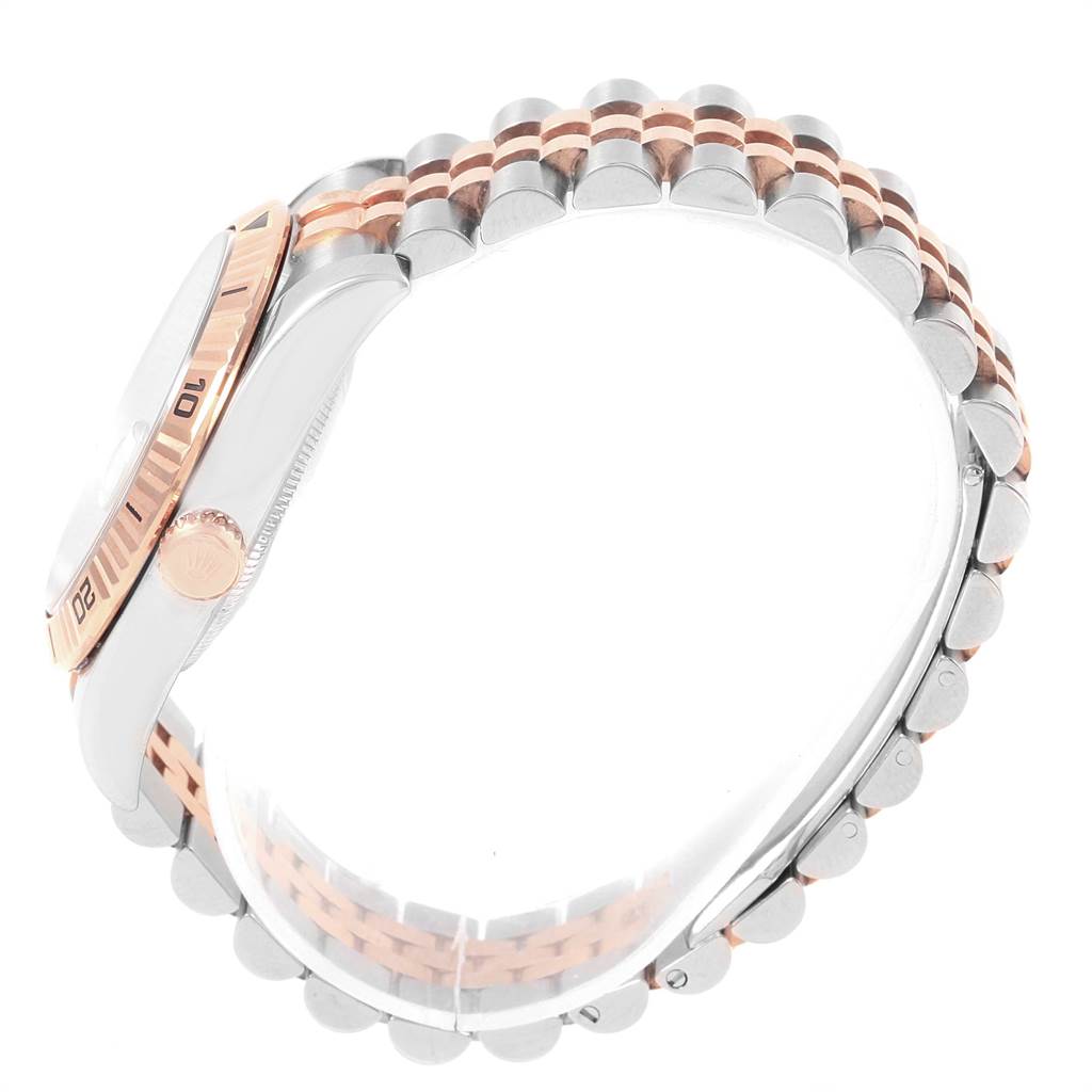 The image shows a side view of a Rolex Turn-o-Graph 116261 Men
s Stainless Steel Silver Dial 116261 Men
s Stainless Steel Silver Dial model, highlighting the bezel, crown, and two-tone bracelet.