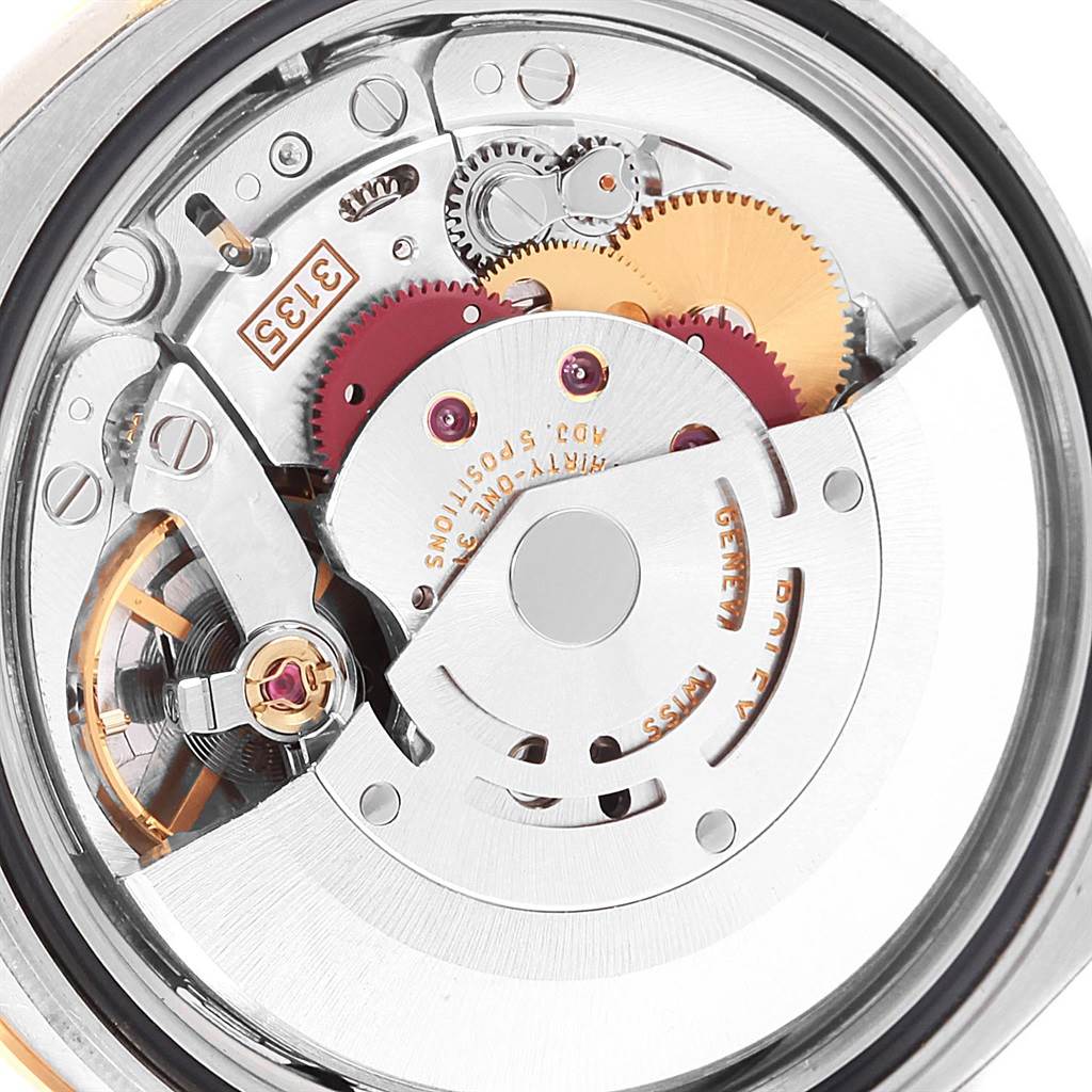 The image shows the exposed internal mechanism of the Rolex Turn-o-Graph 116261 Men's Stainless Steel Black Dial 116261 Men's Stainless Steel Black Dial watch from a top-down angle.