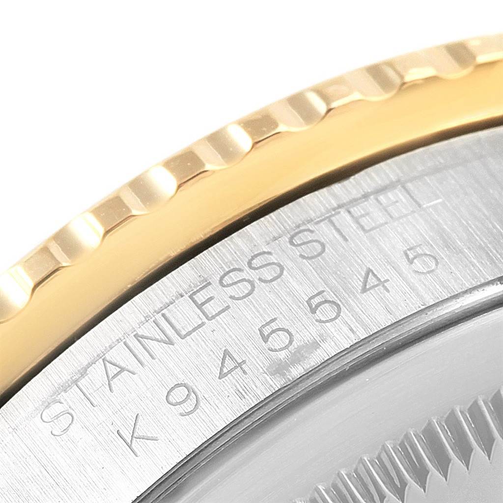 The image shows a close-up of the stainless steel case and gold bezel of a Rolex Turn-o-Graph 16263 Men's Steel and Gold (two tone) Black Dial 16263 Men's Steel and Gold (two tone) Black Dial watch.