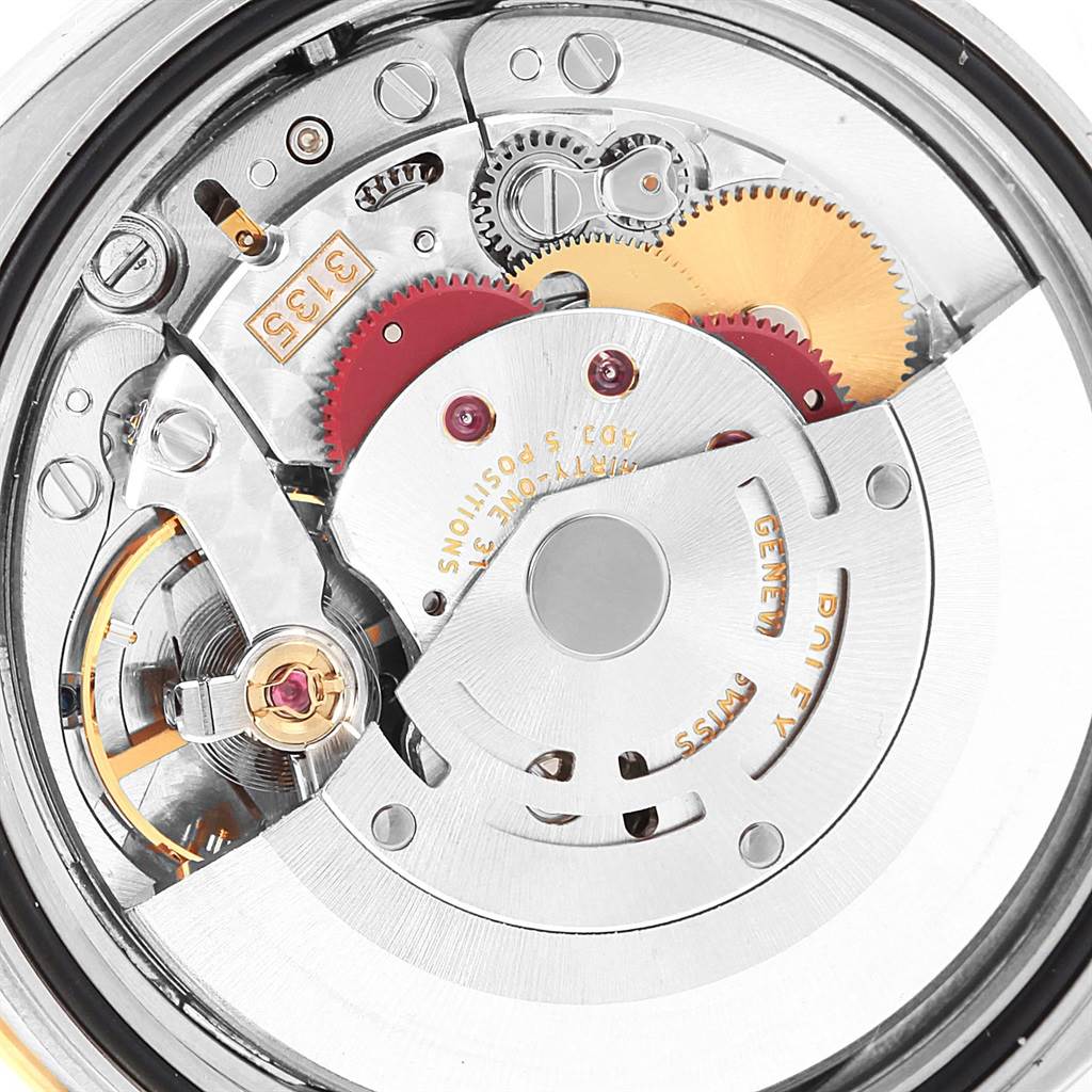 The image shows the inner mechanical movement of the Rolex Turn-o-Graph 116263 Men
s Stainless Steel White Dial 116263 Men
s Stainless Steel White Dial model, viewed from the back with intricate gears and components visible.
