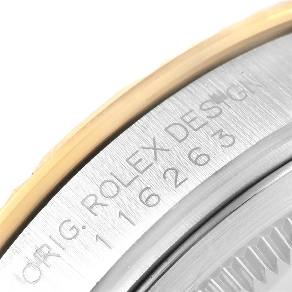 The image shows a close-up of the bezel and part of the case side of a Rolex Turn-o-Graph 116263 Men
s Stainless Steel White Dial 116263 Men
s Stainless Steel White Dial watch, highlighting the engraved model details.