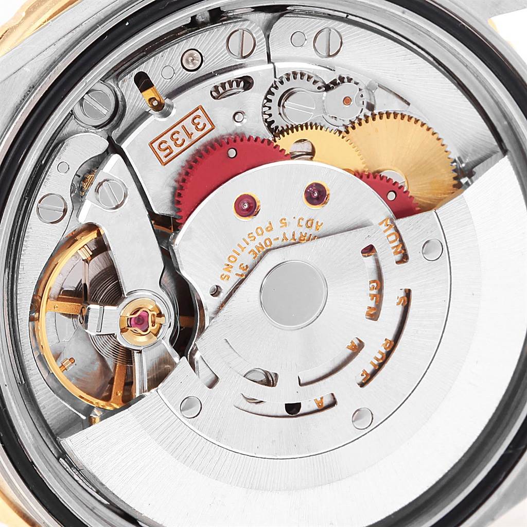 This close-up image shows the intricate internal movement mechanism of the Rolex Turn-o-Graph 16263 Men
s Steel and Gold (two tone) Blue Dial 16263 Men
s Steel and Gold (two tone) Blue Dial watch.