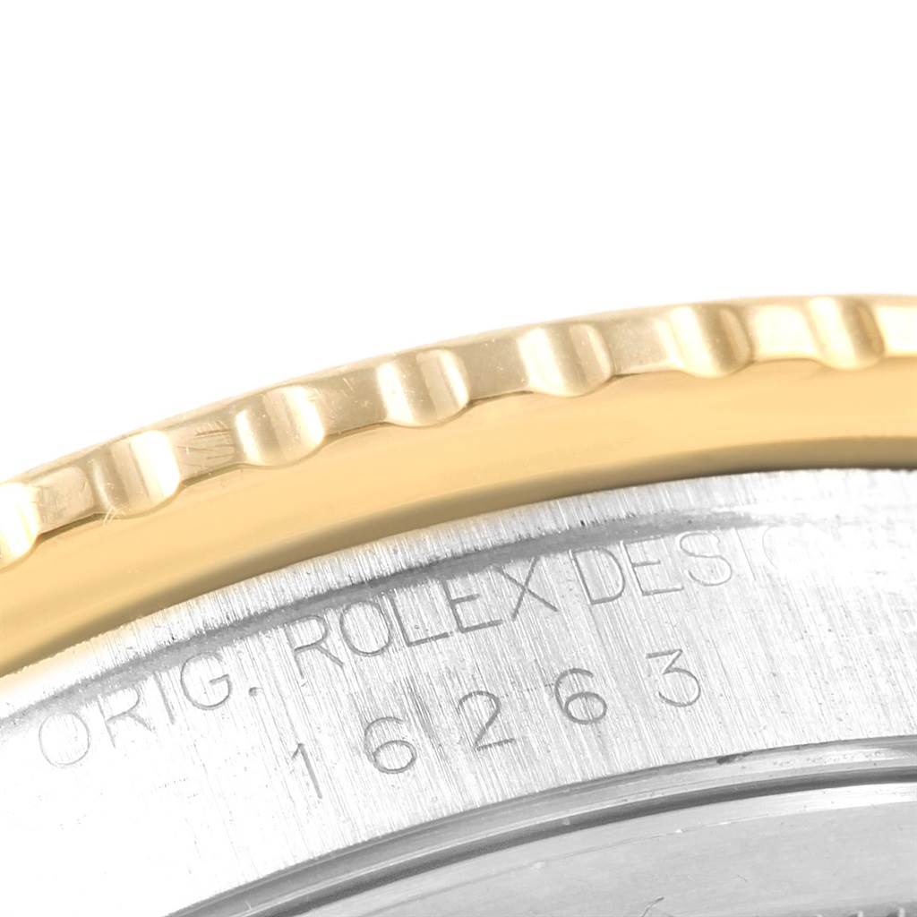 The image shows the side view of the bezel and case, featuring engravings of the Rolex Turn-o-Graph 16263 Men
s Steel and Gold (two tone) Blue Dial 16263 Men
s Steel and Gold (two tone) Blue Dial model.
