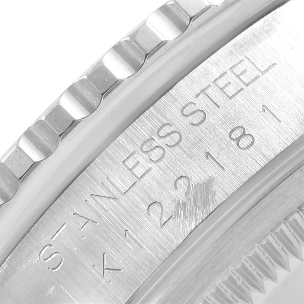 The image shows a close-up of the stainless steel case side and etched text on a Rolex Turn-o-Graph 16264 Men's Stainless Steel White Dial 16264 Men's Stainless Steel White Dial watch.