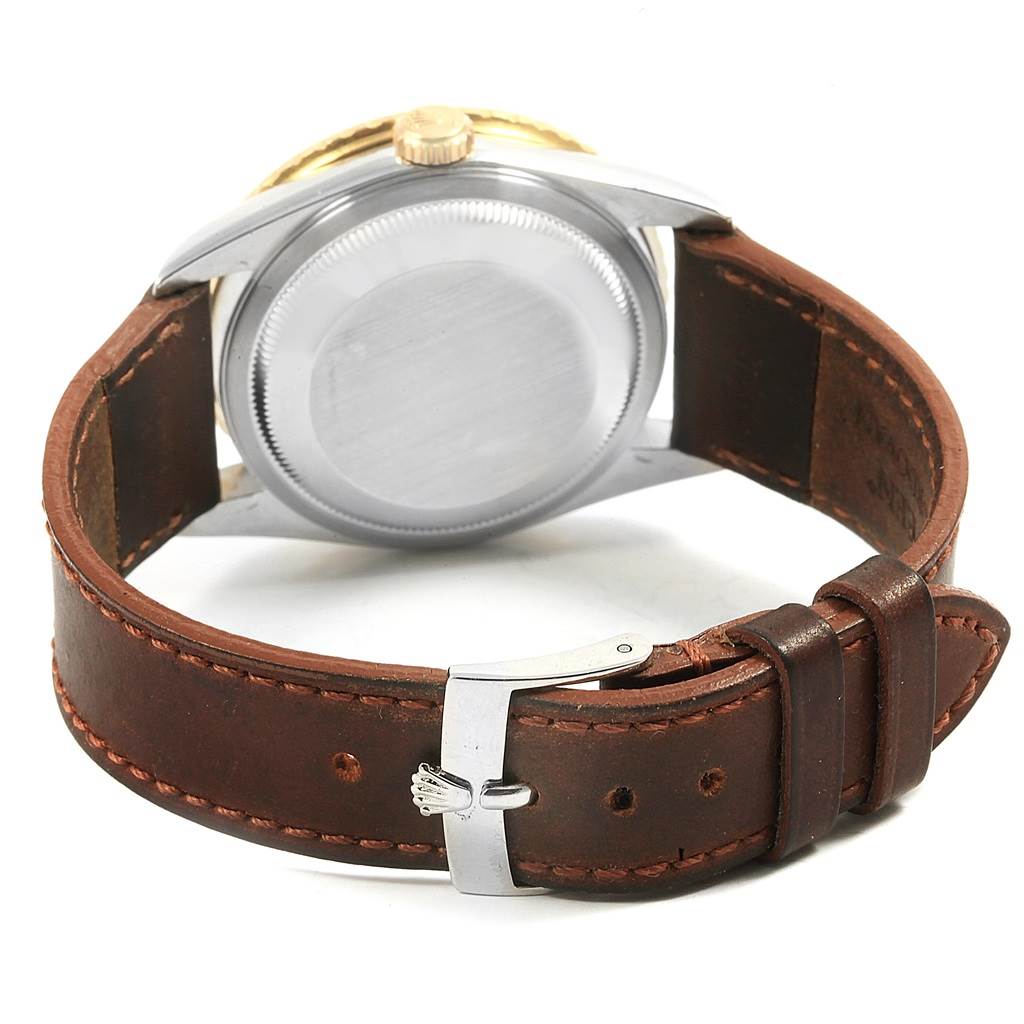 The image shows the back case and brown leather strap with clasp of the Rolex Turn-o-Graph 16263 Men's Steel and Gold (two tone) White Dial 16263 Men's Steel and Gold (two tone) White Dial watch.
