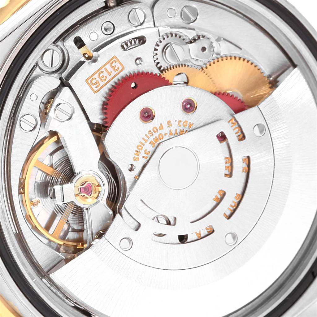 This image shows the internal movement of a Rolex Turn-o-Graph 16263 Men's Steel and Gold (two tone) White Dial 16263 Men's Steel and Gold (two tone) White Dial model, including gears, jewels, and the rotor.