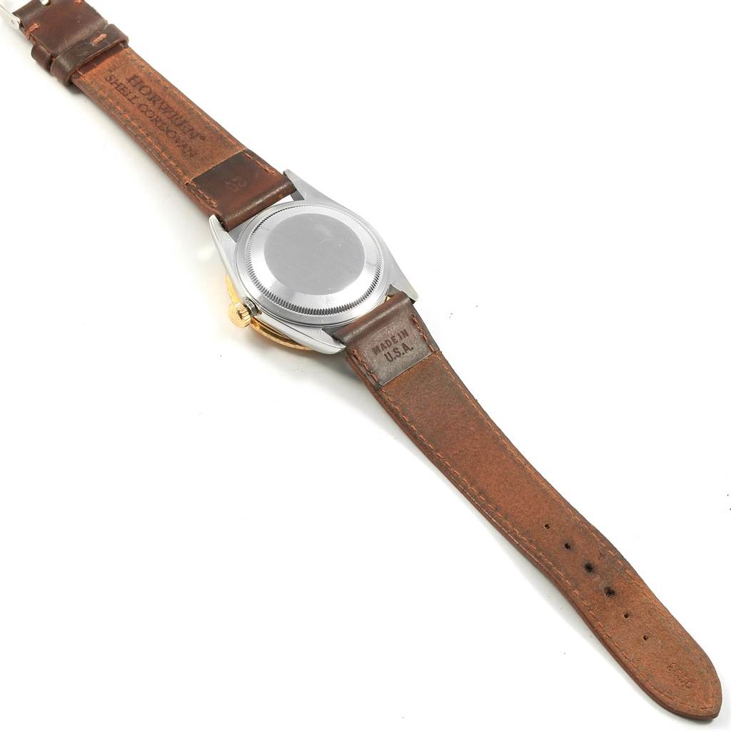 The image shows the back of a Rolex Turn-o-Graph 16263 Men's Steel and Gold (two tone) White Dial 16263 Men's Steel and Gold (two tone) White Dial watch with a leather strap, focusing on the case back and band.