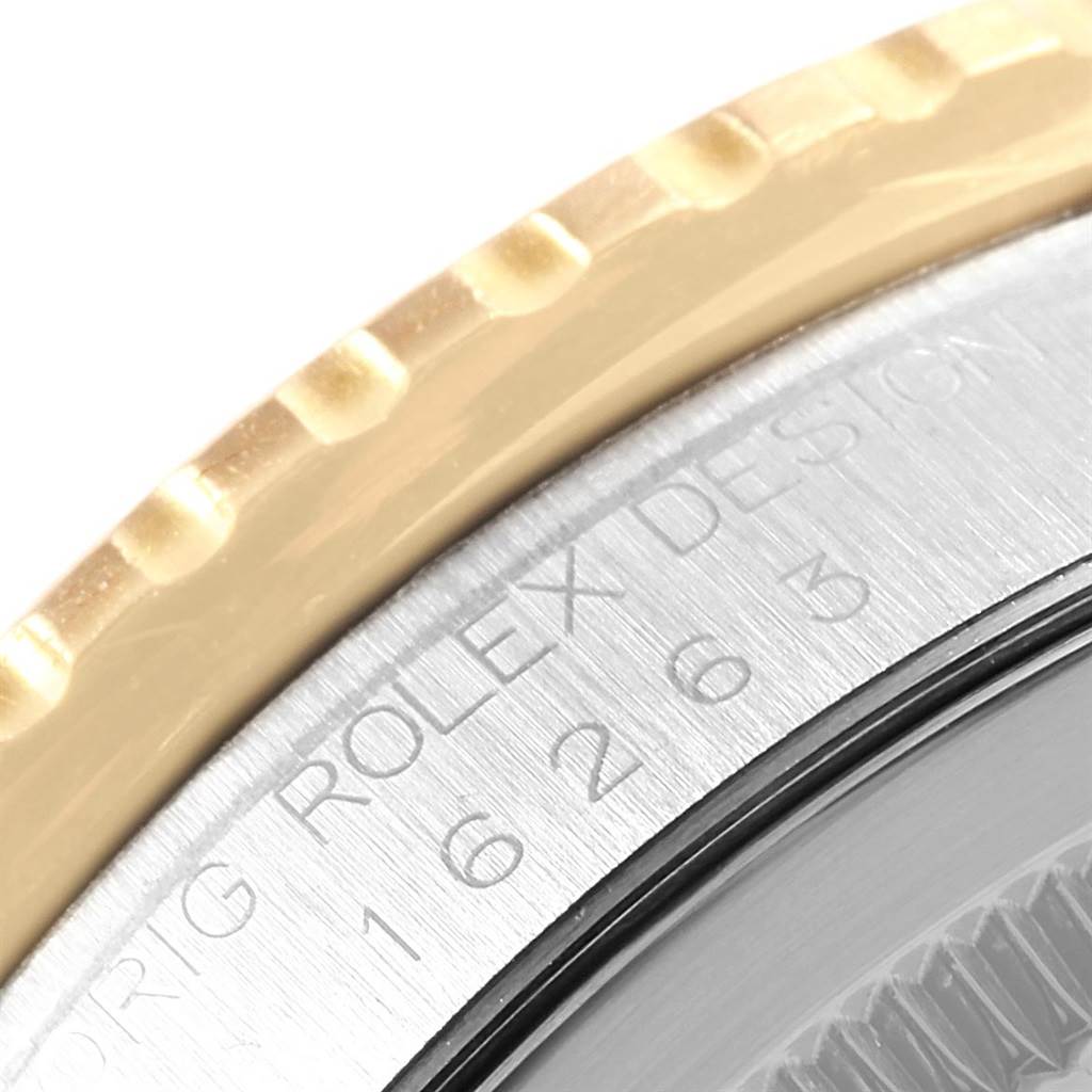 This image shows a close-up of the bezel and part of the case back of a Rolex Turn-o-Graph 16263 Men's Steel and Gold (two tone) White Dial 16263 Men's Steel and Gold (two tone) White Dial watch.