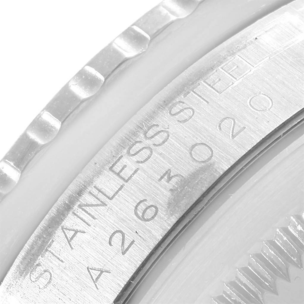 This image shows a close-up angle of the stainless steel engraved bezel and case of a Rolex Turn-o-Graph 16264 Men's Stainless Steel Black Dial 16264 Men's Stainless Steel Black Dial watch.