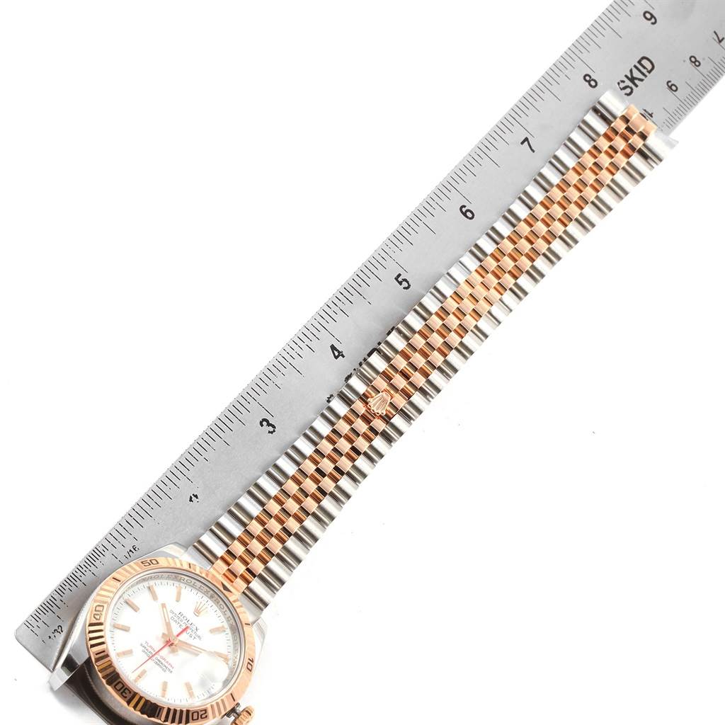 The image shows the face and band of a Rolex Turn-o-Graph 116261 Men's Stainless Steel White Dial 116261 Men's Stainless Steel White Dial watch, measured against a ruler.