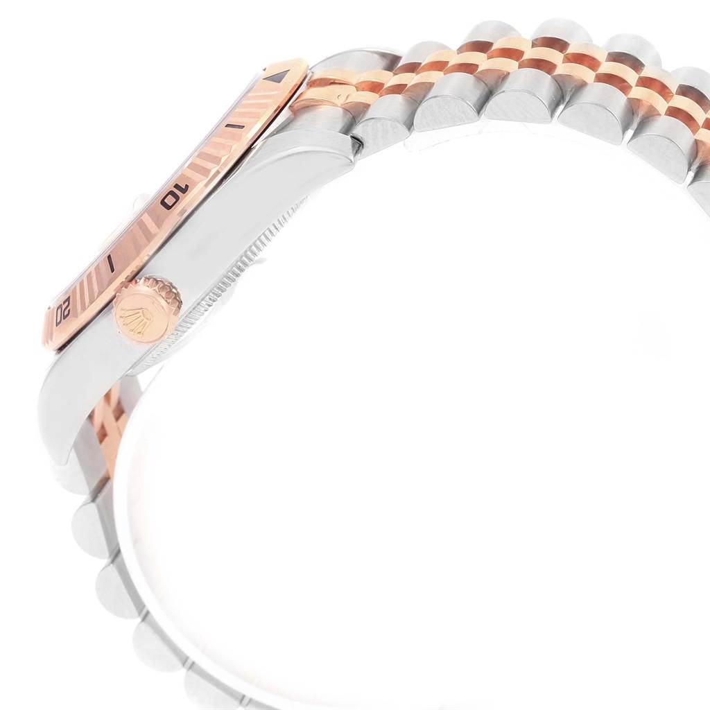 The image shows a side view of the Rolex Turn-o-Graph 116261 Men's Stainless Steel White Dial 116261 Men's Stainless Steel White Dial model, highlighting the bezel, crown, and a portion of the bracelet.