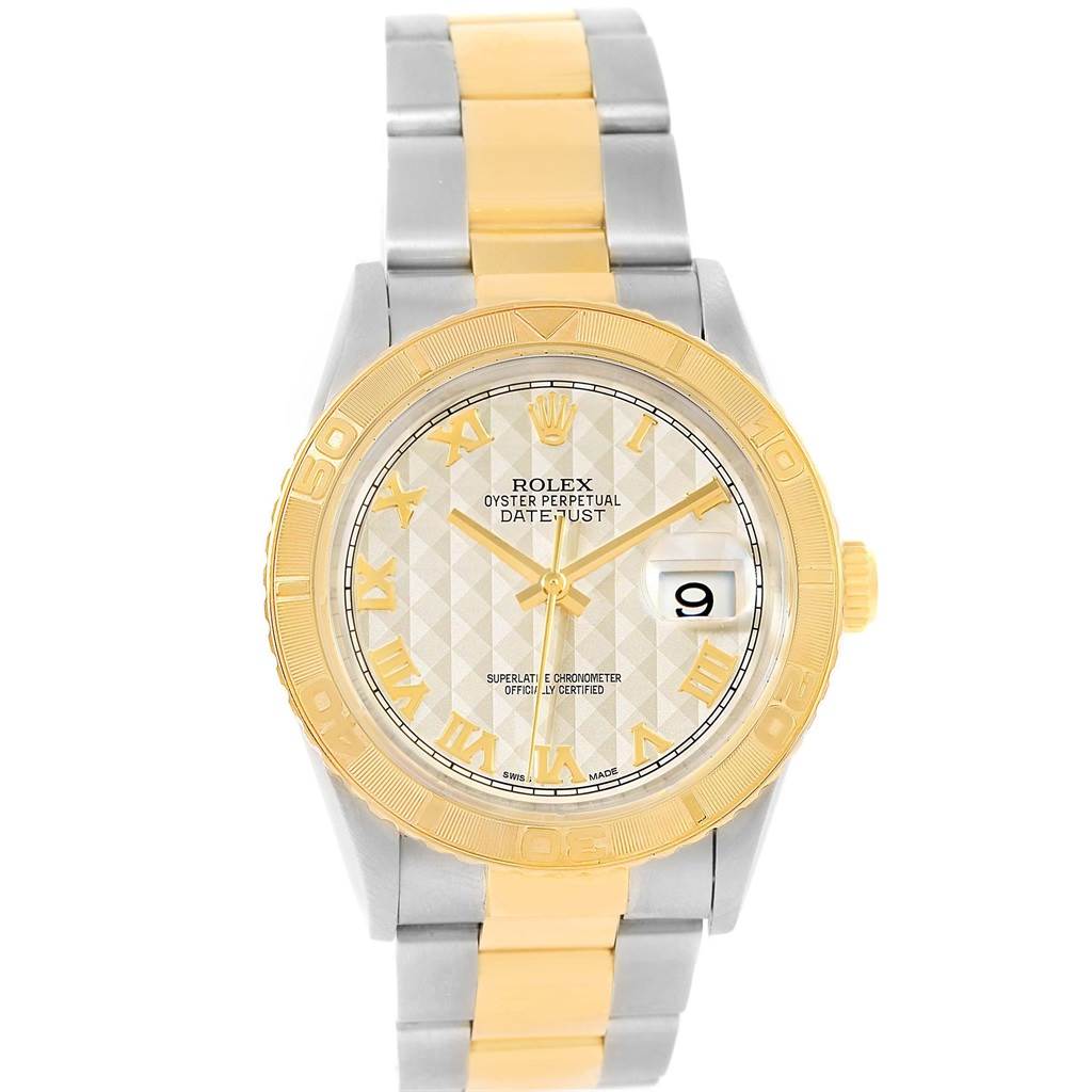 This image shows a front view of the Rolex Turn-o-Graph 16263 Men
s Steel and Gold (two tone) Beige Dial 16263 Men
s Steel and Gold (two tone) Beige Dial watch, highlighting its gold bezel, dial, and two-tone bracelet.