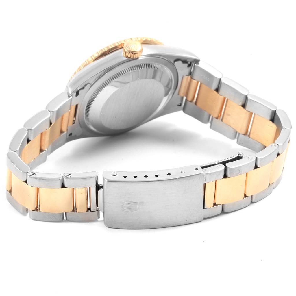 The image shows the back view of a Rolex Turn-o-Graph 16263 Men
s Steel and Gold (two tone) Beige Dial 16263 Men
s Steel and Gold (two tone) Beige Dial watch, focusing on its case back, crown, and bi-color bracelet with a clasp.