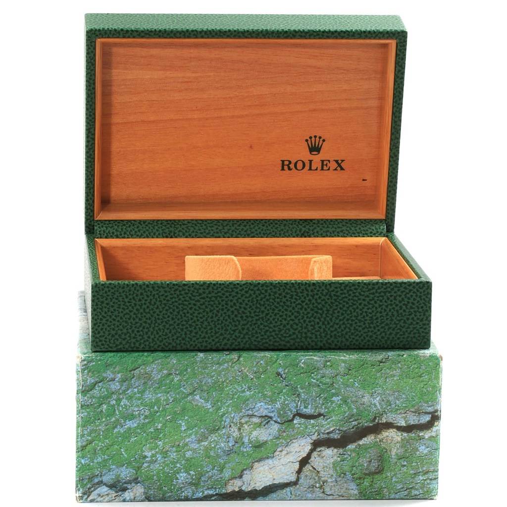 This image shows an open Rolex watch box for the Turn-o-Graph model, revealing a green exterior and wooden interior.