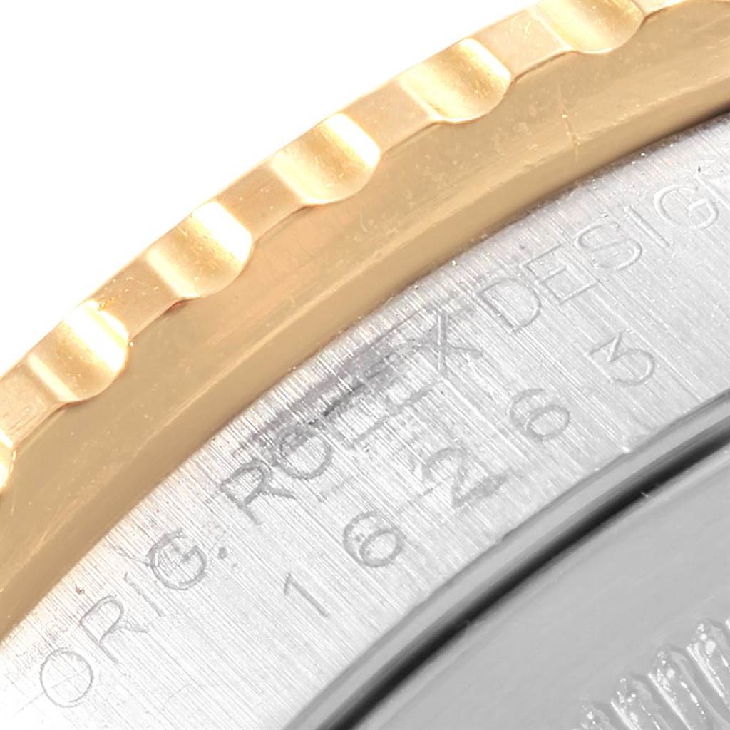 This image shows a close-up of the bezel and case back of a Rolex Turn-o-Graph 16263 Men
s Steel and Gold (two tone) Beige Dial 16263 Men
s Steel and Gold (two tone) Beige Dial watch.