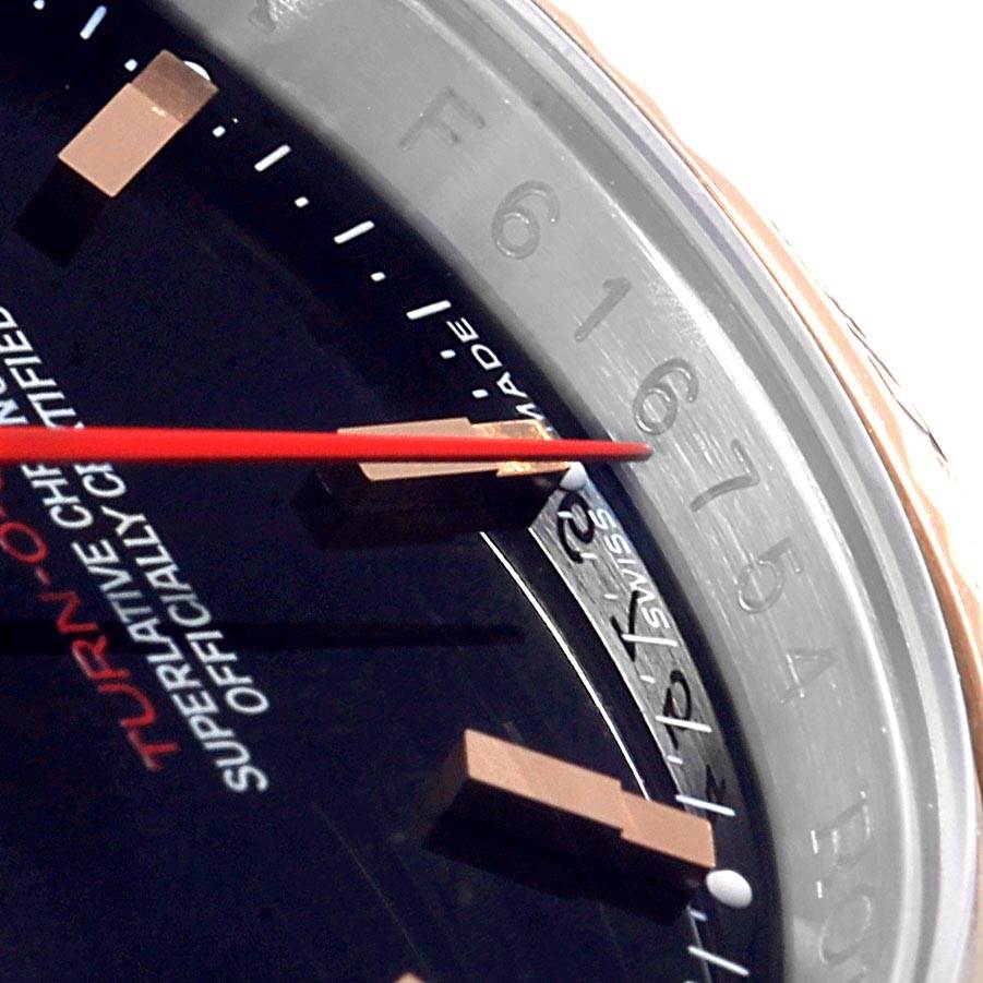 The image shows a close-up of the dial and bezel's inner edge of a Rolex Turn-o-Graph 116261 Men's Stainless Steel Black Dial 116261 Men's Stainless Steel Black Dial watch, highlighting the hands, markers, and text.