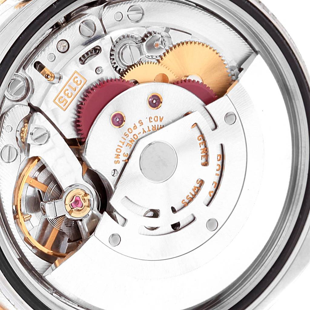 The image shows the internal mechanical movement of a Rolex Turn-o-Graph 116261 Men's Stainless Steel Black Dial 116261 Men's Stainless Steel Black Dial watch from a close-up angle.