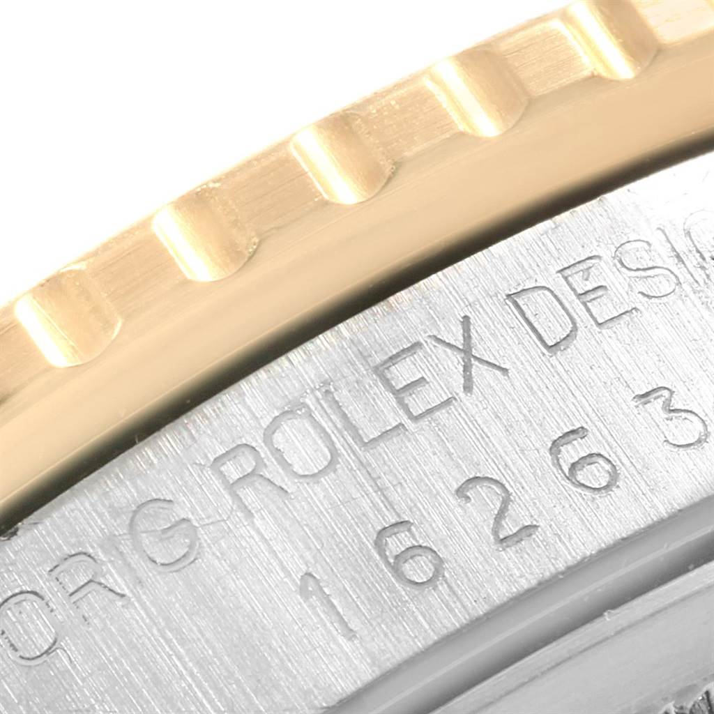 The image shows a close-up of the bezel and engraved text on the case of a Rolex Turn-o-Graph 16263 Men
s Steel and Gold (two tone) Champagne Dial 16263 Men
s Steel and Gold (two tone) Champagne Dial watch.