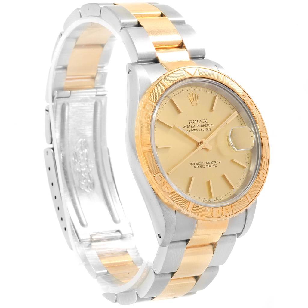 The image shows a Rolex Turn-o-Graph 16263 Men
s Steel and Gold (two tone) Champagne Dial 16263 Men
s Steel and Gold (two tone) Champagne Dial watch angled to display the face, bezel, and part of the two-tone bracelet.