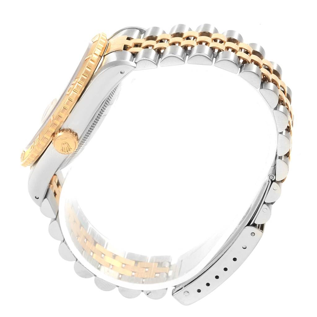 The image shows a side angle of a Rolex Turn-o-Graph 16263 Men's Steel and Gold (two tone) Champagne Dial 16263 Men's Steel and Gold (two tone) Champagne Dial watch featuring the crown, case, and two-tone bracelet.