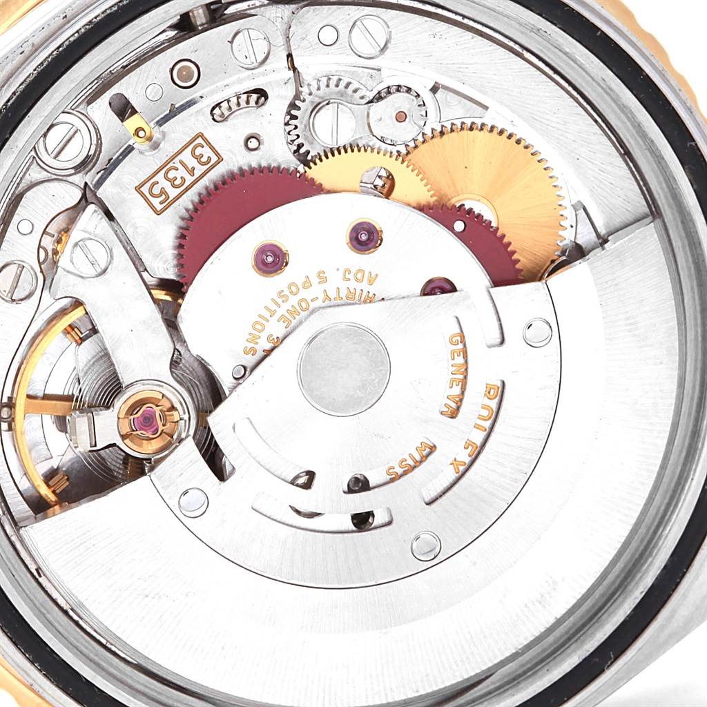 This image shows the internal mechanical components of a Rolex Turn-o-Graph 16263 Men's Steel and Gold (two tone) Champagne Dial 16263 Men's Steel and Gold (two tone) Champagne Dial watch viewed from the rear.