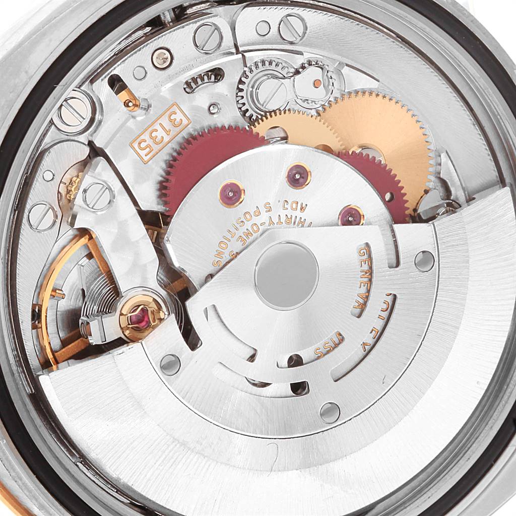 This image shows the internal mechanical movement of a Rolex Turn-o-Graph 116261 Men
s Stainless Steel Silver Dial 116261 Men
s Stainless Steel Silver Dial watch from a close-up angle.