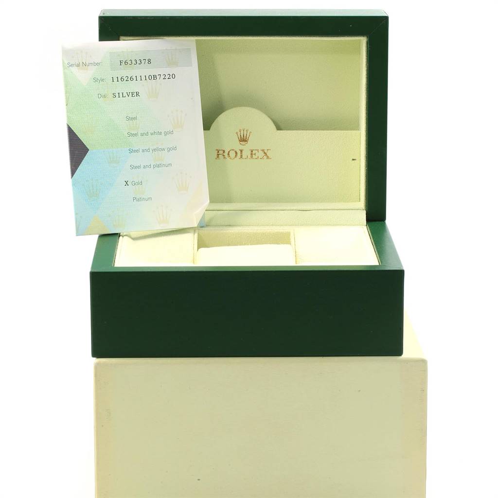 The image shows an open box for the Rolex Turn-o-Graph 116261 Men
s Stainless Steel Silver Dial 116261 Men
s Stainless Steel Silver Dial model, including some paperwork and a certificate.