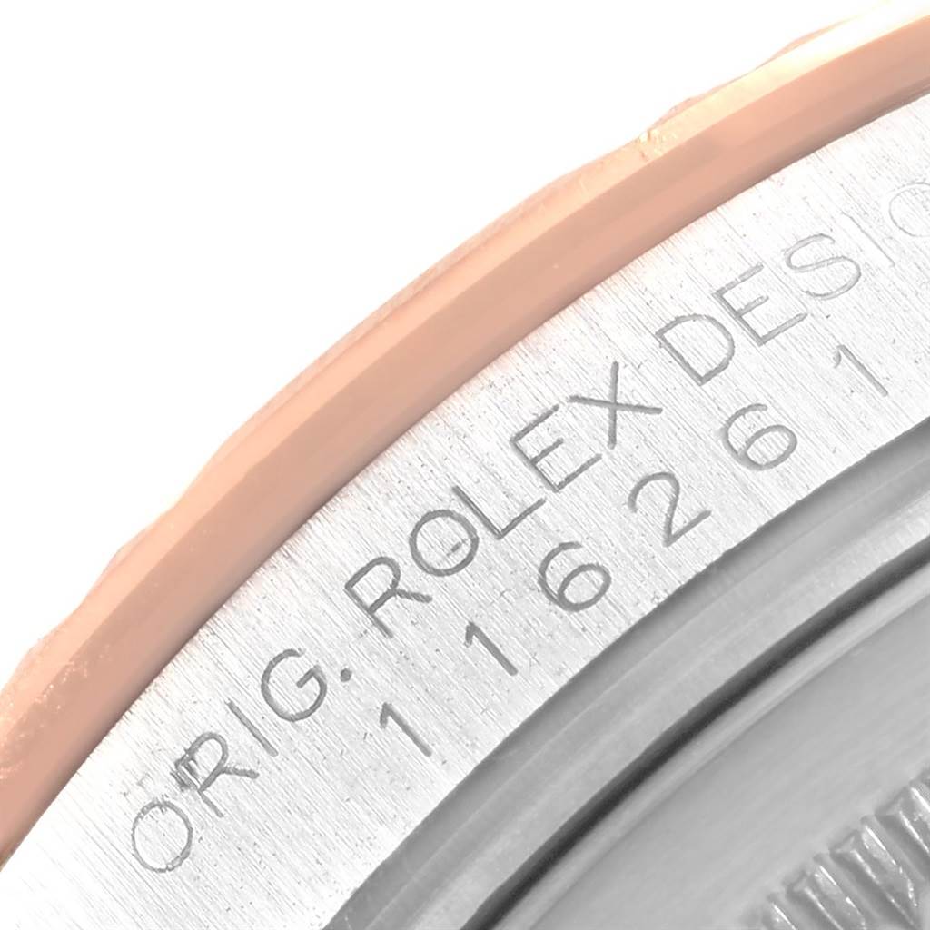 This image shows a close-up angle of the Turn-o-Graph model by Rolex, focusing on the bezel engraving and part of the case.