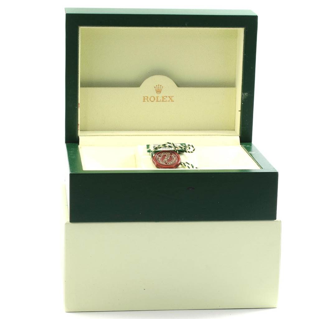 The image shows an open Rolex Turn-o-Graph 116264 Men
s Stainless Steel Black Dial 116264 Men
s Stainless Steel Black Dial watch box with its interior and a green and white tag.