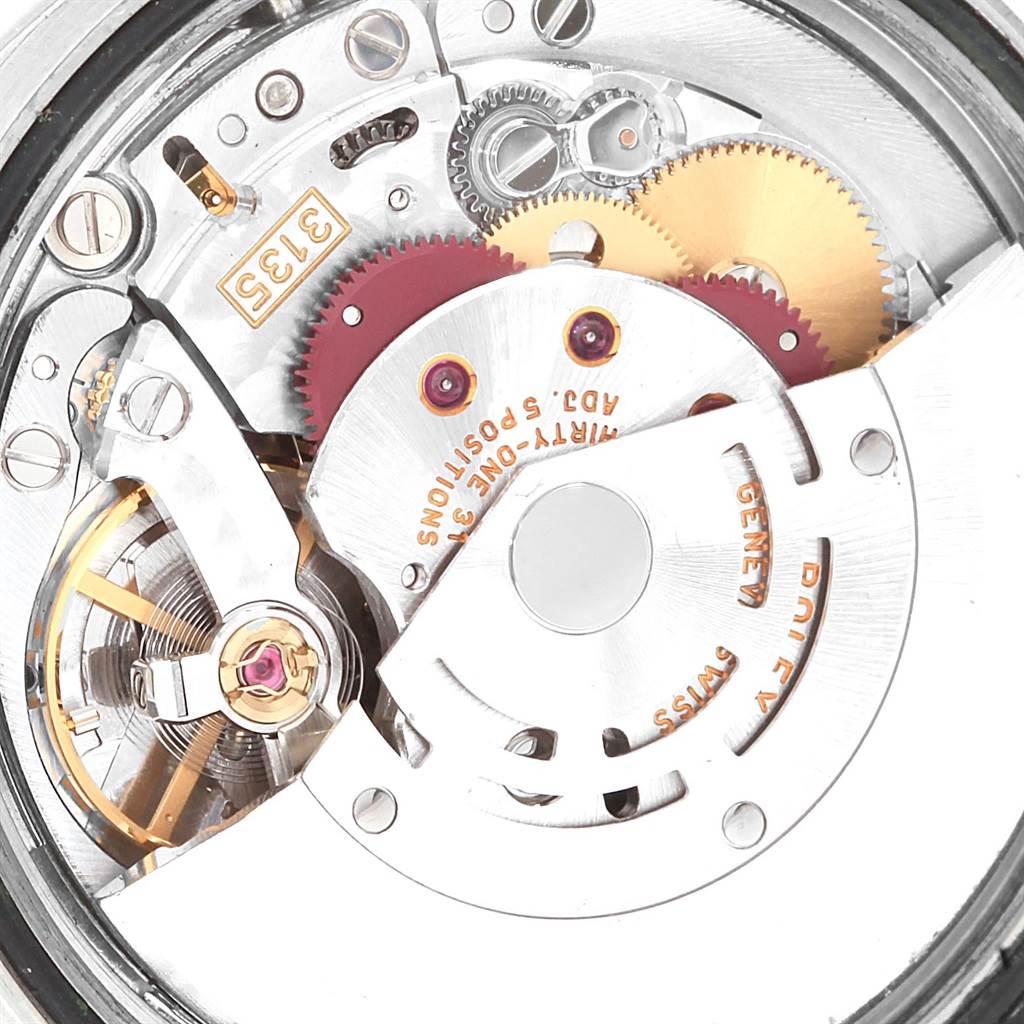 This close-up image shows the internal mechanism and gears of a Rolex Turn-o-Graph 116263 Men's Stainless Steel White Dial 116263 Men's Stainless Steel White Dial watch.