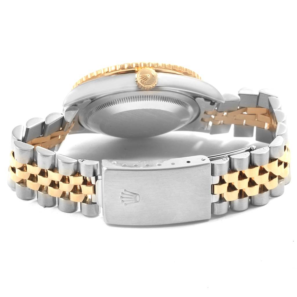 This image shows the Rolex Turn-o-Graph 16263 Men's Steel and Gold (two tone) White Dial 16263 Men's Steel and Gold (two tone) White Dial watch from a rear angle, focusing on the clasp, bracelet, and side of the case.