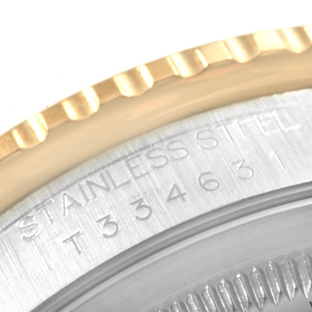 The image shows a close-up of the case back and bezel of a Rolex Turn-o-Graph 16263 Men's Steel and Gold (two tone) White Dial 16263 Men's Steel and Gold (two tone) White Dial watch, highlighting its stainless steel construction.