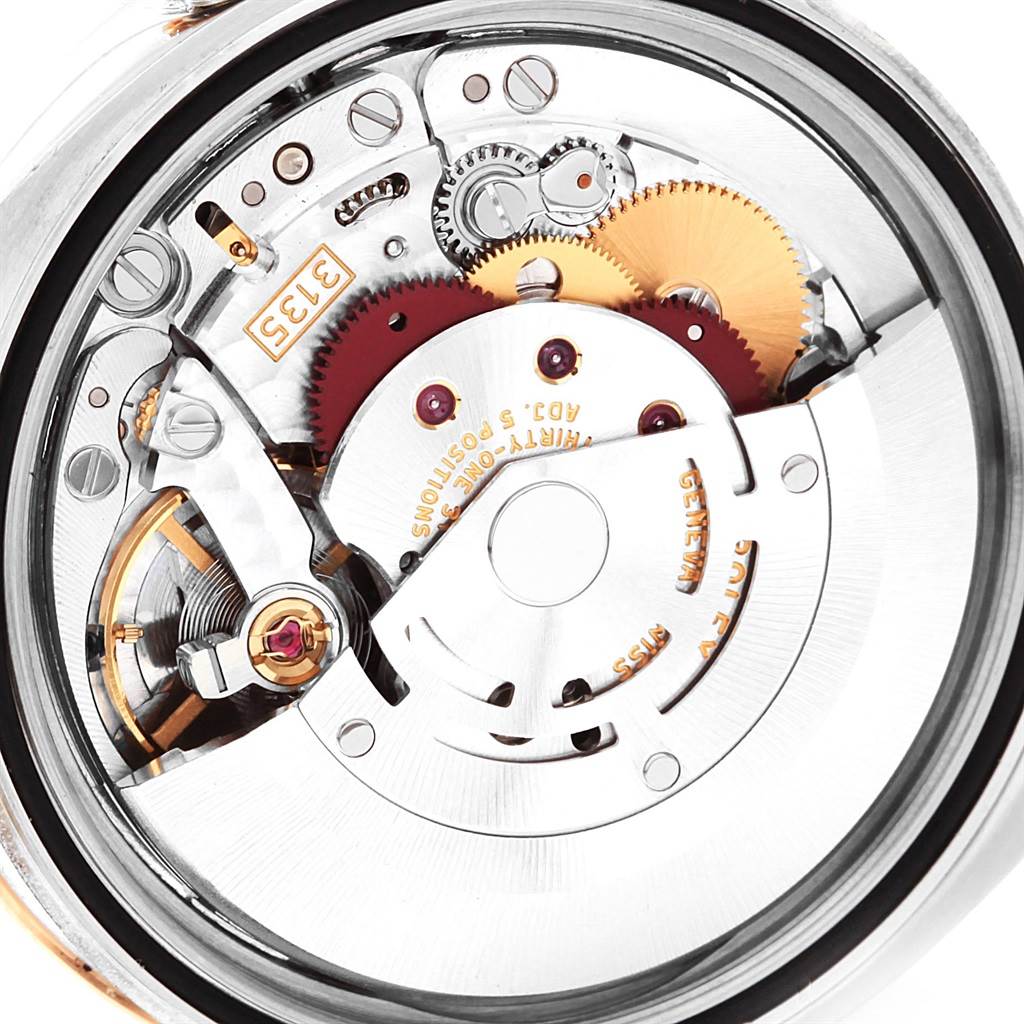 This image shows the internal movement and mechanical components of the Rolex Turn-o-Graph 116261 Men's Stainless Steel Black Dial 116261 Men's Stainless Steel Black Dial watch from a close-up angle.