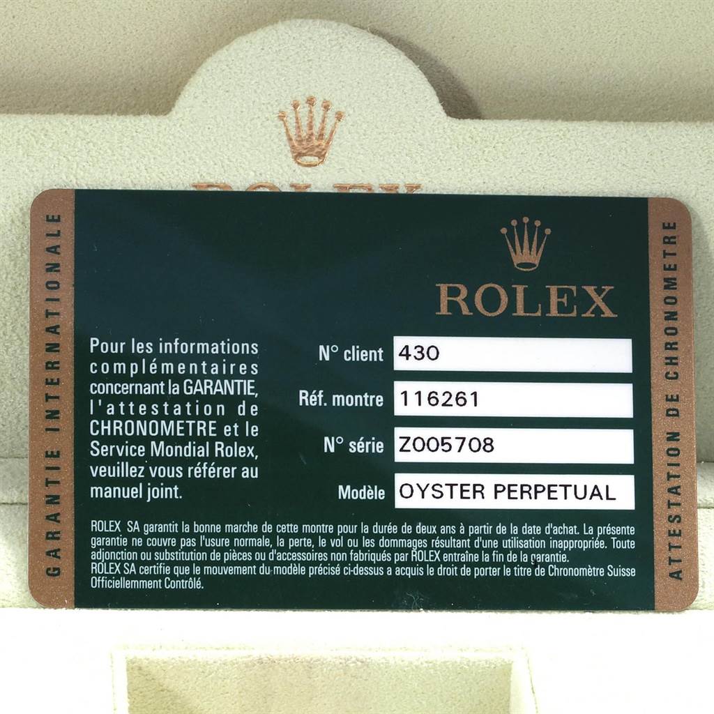 This image shows a warranty card for a Rolex Turn-o-Graph 116261 Men's Stainless Steel Black Dial 116261 Men's Stainless Steel Black Dial model.
