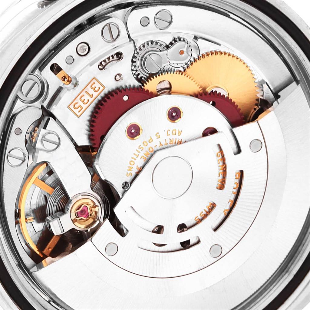 This image shows the intricate internal movement and mechanics of a Rolex Turn-o-Graph 116264 Men's Stainless Steel White Dial 116264 Men's Stainless Steel White Dial watch from a close-up angle.