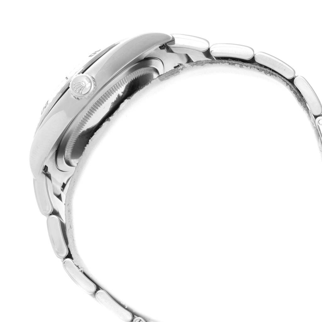 This image shows the side profile of a Rolex Turn-o-Graph 116264 Men's Stainless Steel White Dial 116264 Men's Stainless Steel White Dial watch, focusing on the crown and part of the metal bracelet.