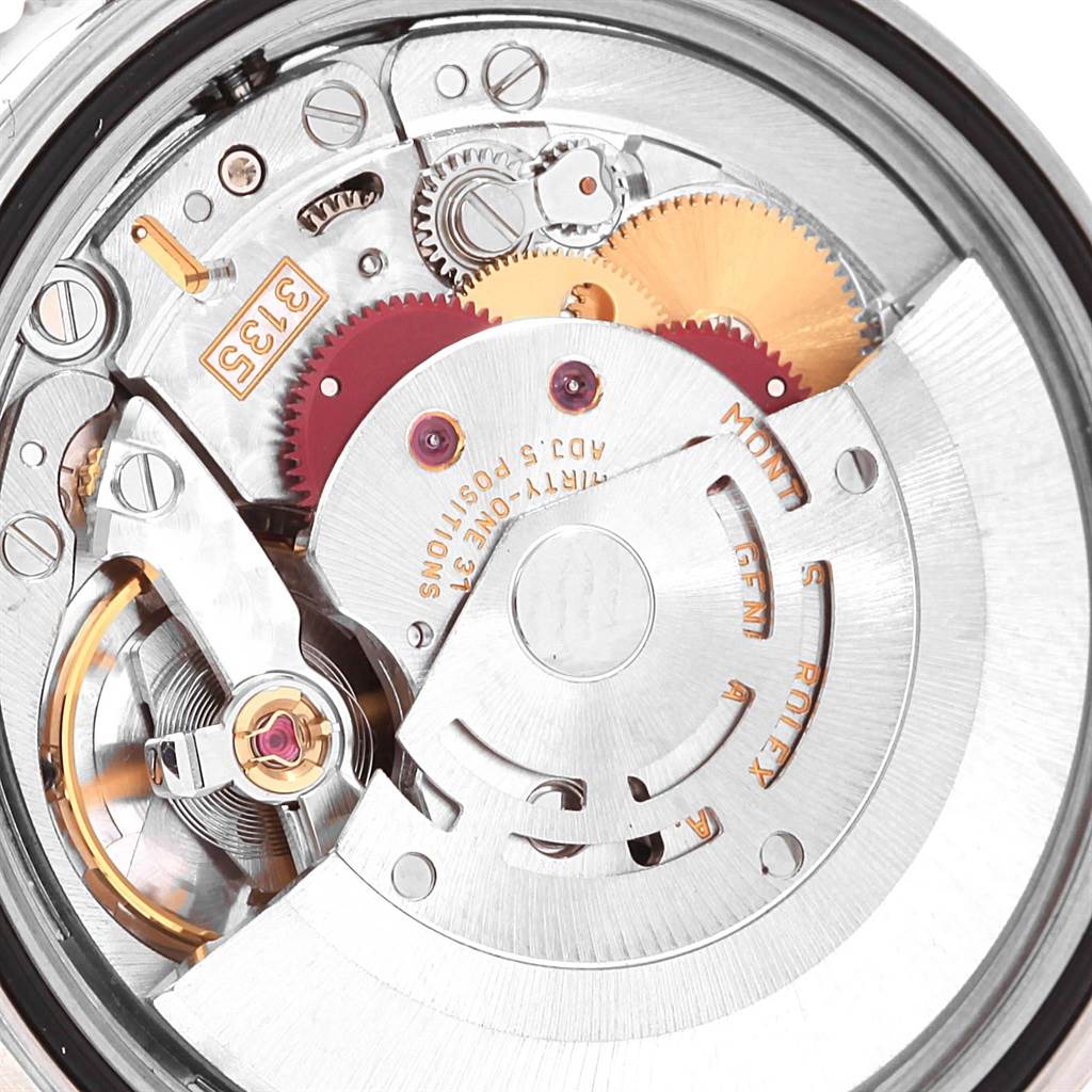 The image shows an internal view of the Rolex Turn-o-Graph 16264 Men
s Stainless Steel Blue Dial 16264 Men
s Stainless Steel Blue Dial watch movement components and mechanisms.