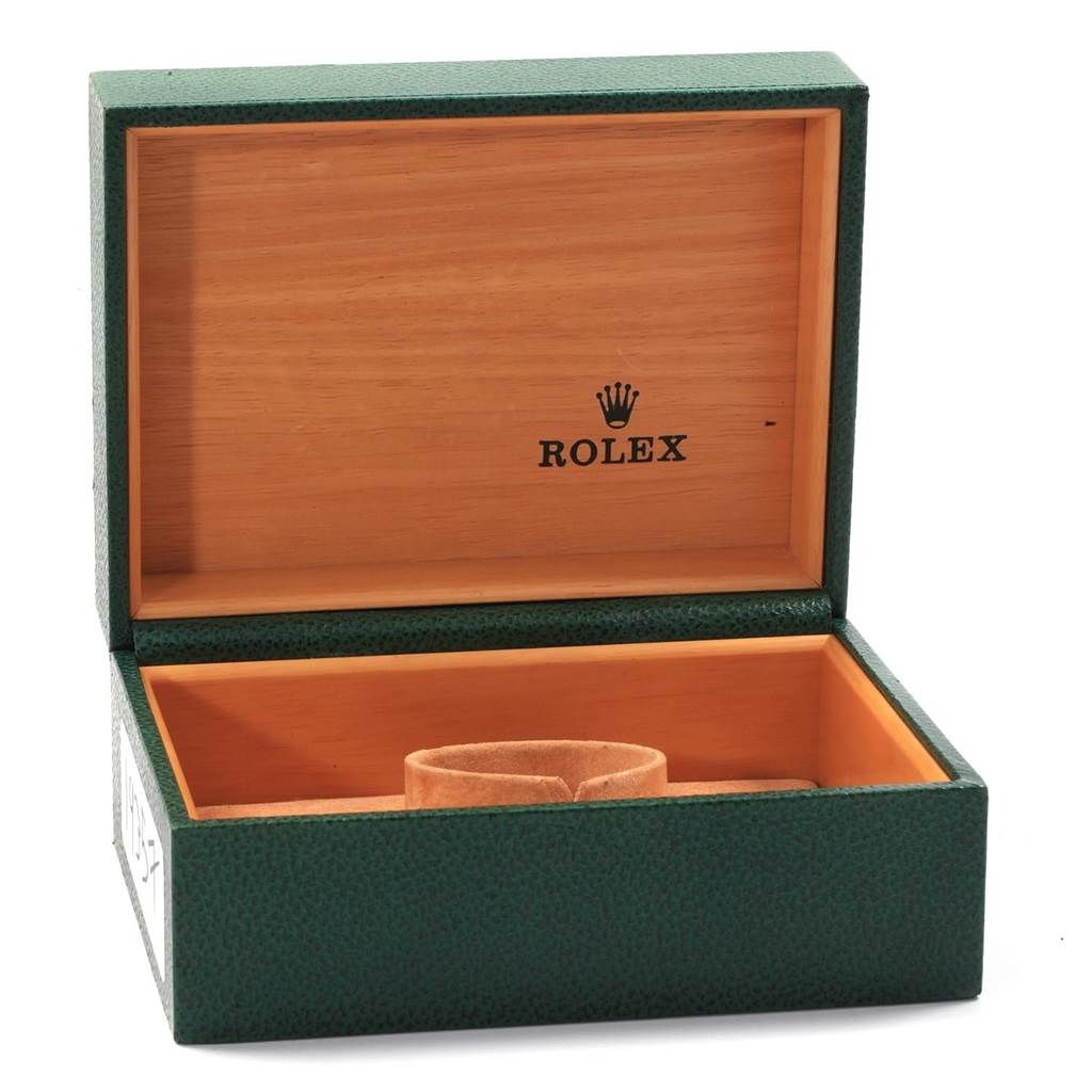 The image shows an open green watch box for a Rolex Turn-o-Graph 16264 Men
s Stainless Steel Blue Dial 16264 Men
s Stainless Steel Blue Dial model, displaying the interior cushion and the Rolex logo.
