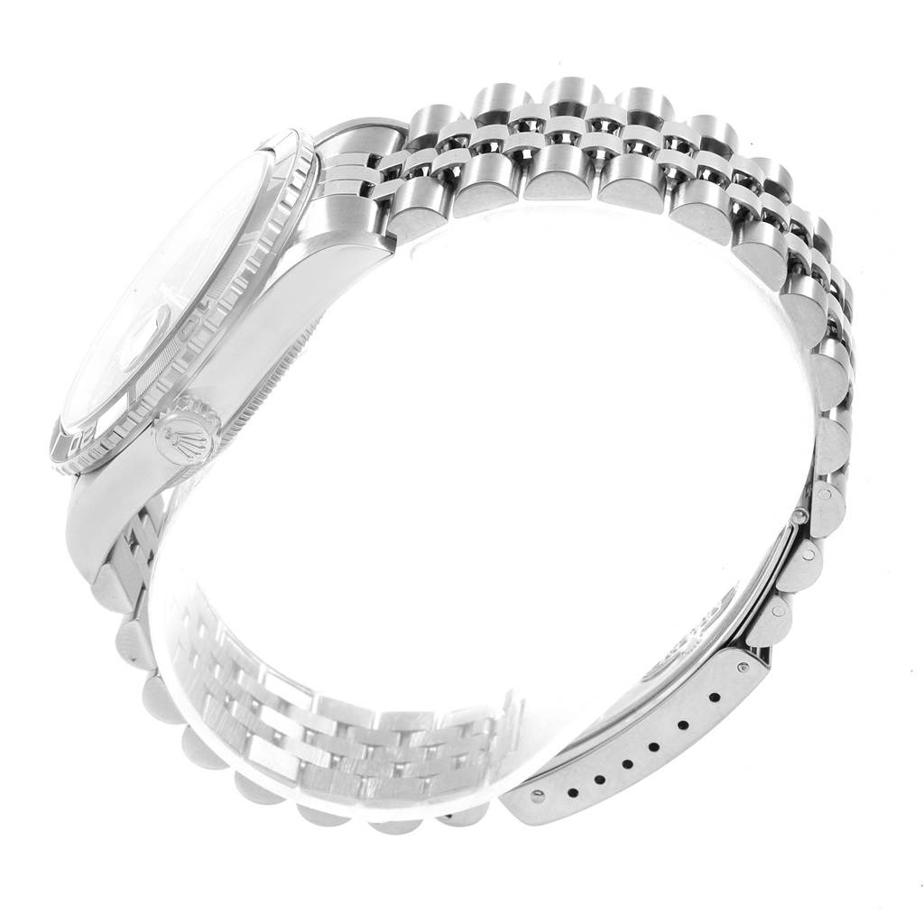 The Rolex Turn-o-Graph 16264 Men
s Stainless Steel Blue Dial 16264 Men
s Stainless Steel Blue Dial model watch is shown from a side angle, highlighting its bracelet and partial view of the case and crown.