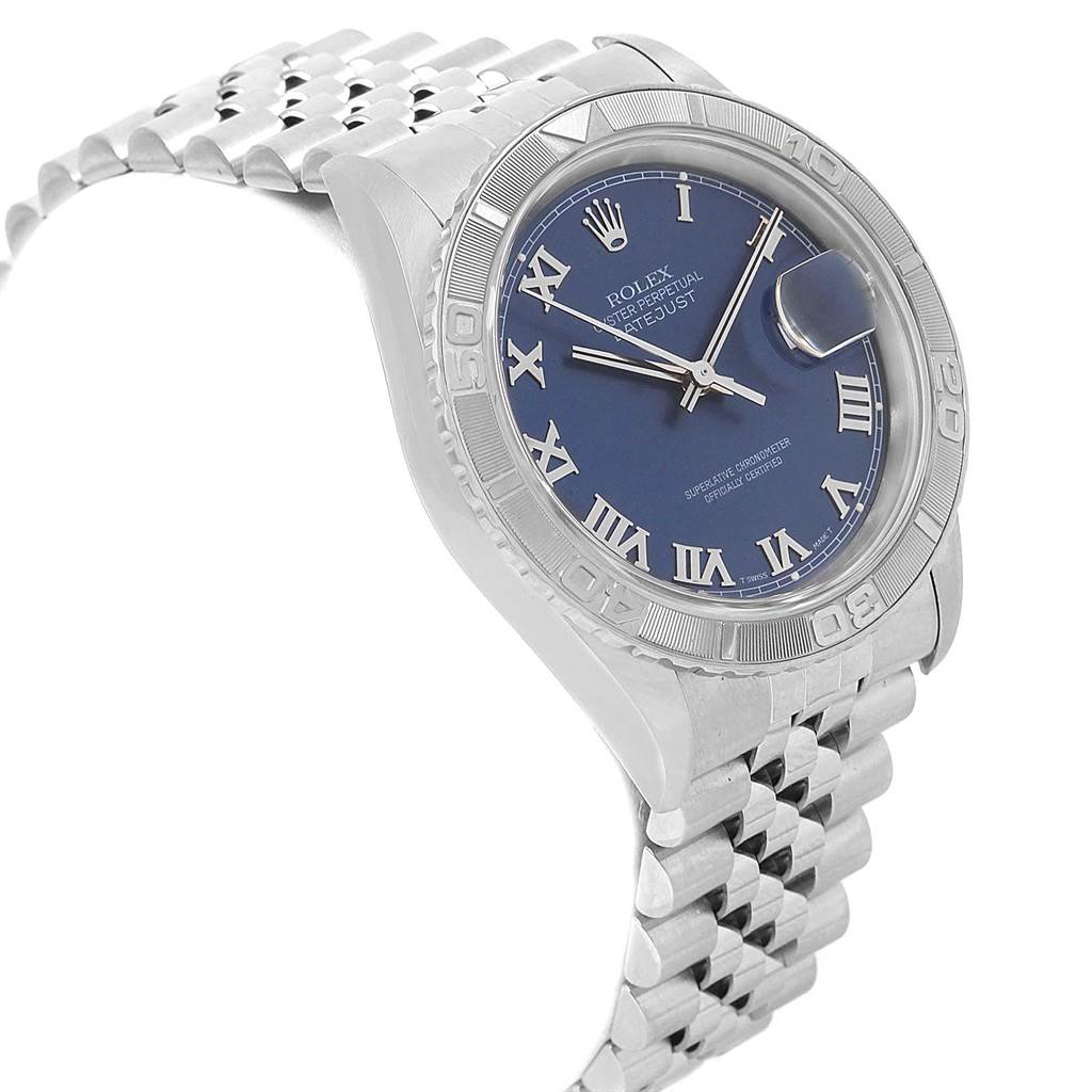 The image shows a side angle of a Rolex Turn-o-Graph 16264 Men
s Stainless Steel Blue Dial 16264 Men
s Stainless Steel Blue Dial watch featuring its bezel, dial, and partial bracelet.