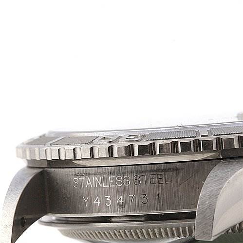 The image shows a side view of a Rolex Turn-o-Graph 16264 Men's Stainless Steel Grey Dial 16264 Men's Stainless Steel Grey Dial watch, highlighting the engraved serial number and part of the bezel.