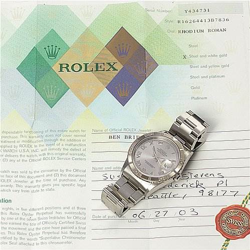 The image shows a Rolex Turn-o-Graph 16264 Men's Stainless Steel Grey Dial 16264 Men's Stainless Steel Grey Dial watch positioned flat, displaying the dial, bracelet, and accompanying certification documents.