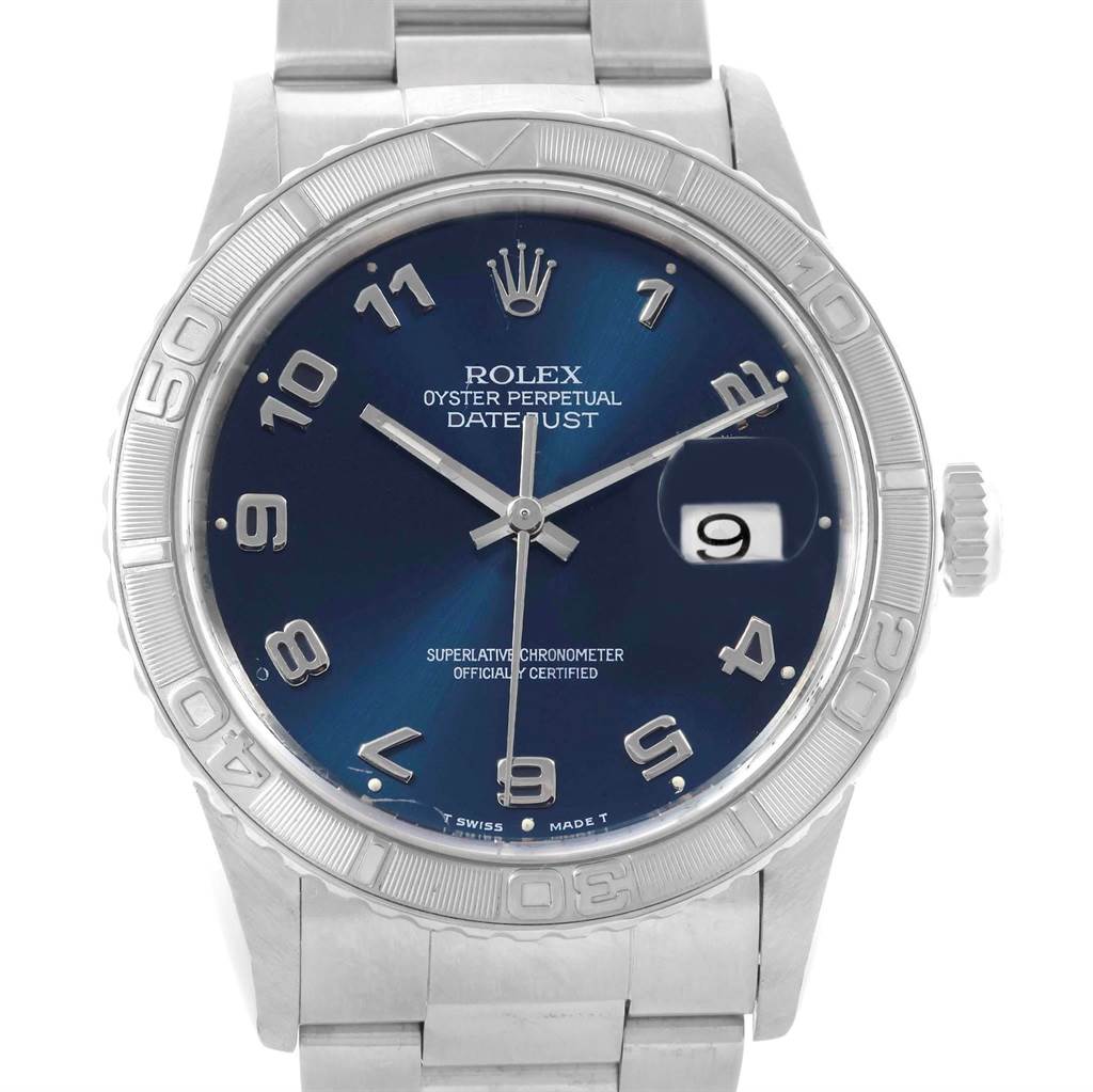 The image shows a top-down view of a Rolex Turn-o-Graph 16264 Men
s Stainless Steel Blue Dial 16264 Men
s Stainless Steel Blue Dial Datejust watch, highlighting the face, bezel, and bracelet.