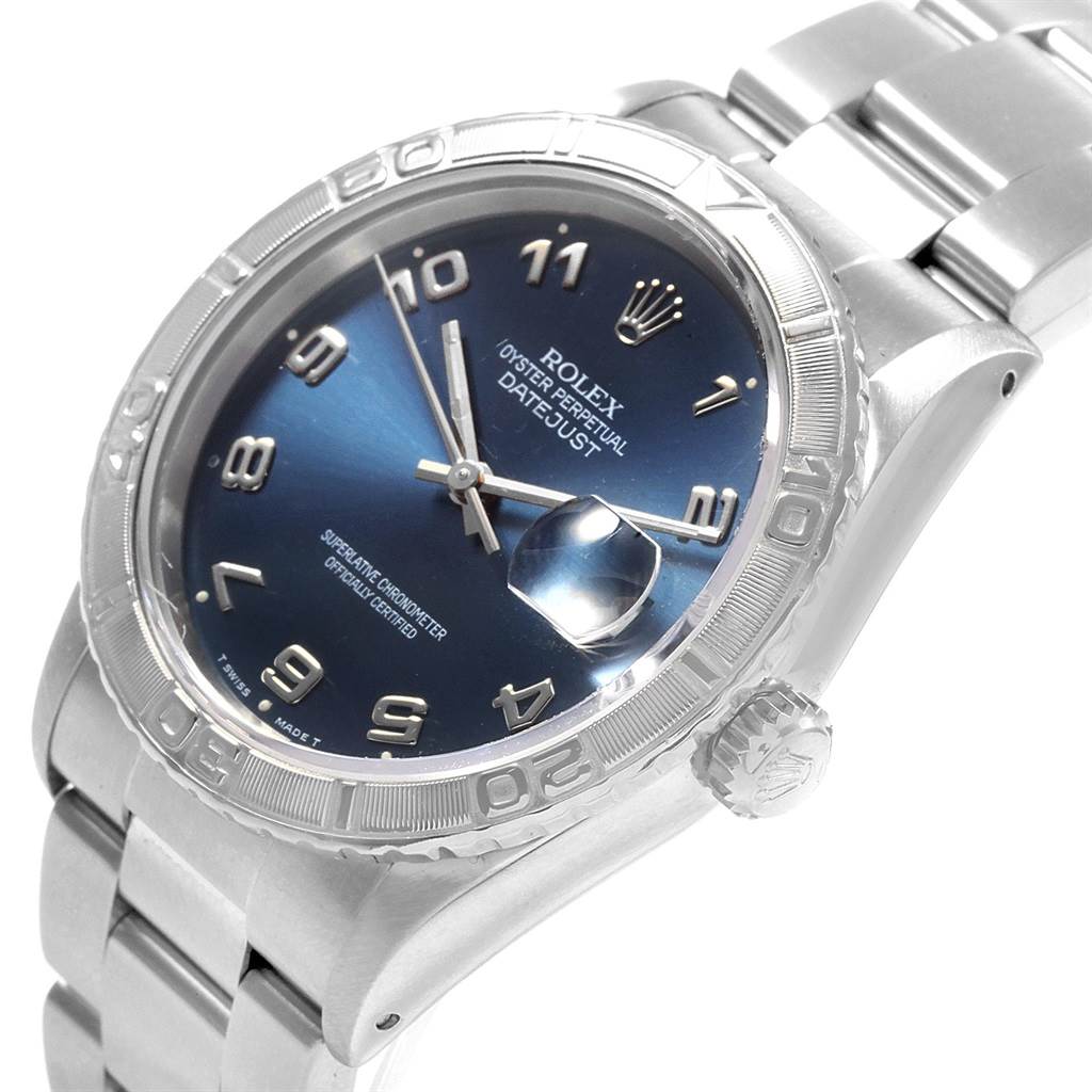 The Rolex Turn-o-Graph 16264 Men
s Stainless Steel Blue Dial 16264 Men
s Stainless Steel Blue Dial watch is shown at a slight angle, displaying its dial, bezel, bracelet, and crown.